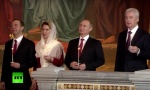 Putin i Medvedev sa hiljadama vernika u Hramu Hrista Spasitelja (VIDEO)
