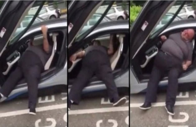 (VIDEO) DEBELJUCA U PROBLEMU Borba da izadje iz spustenog BMW a postala je hit na internetu