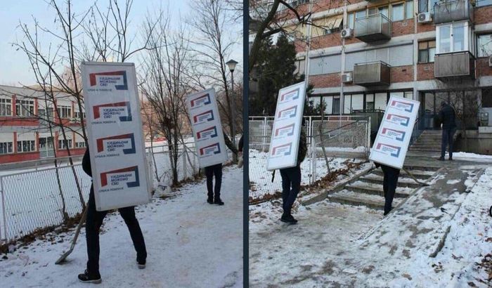 FOTO: Aktivisti čistili sneg sa stranačkom tablom na leđima; Vučić: Ne vidim ništa loše