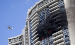 FOTO: Požar u zgradi, tri osobe nastradale, 12 povređno