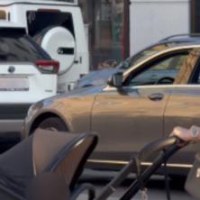 (FOTO) Snimili smo Rialdu u Beču sa ćerkicom, vozi skupoceni automobil, obilazi butike i fura torbu od 30.000 evra