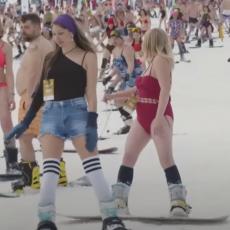 HAJDEMO U PLANINE JER TAMO NEMA ZIME: Golišave devojke i mladići se u kupaćim kostimama skijali (VIDEO)