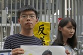 Honkoški aktivista uguran u privatni automobil; 10.000 kineskih vojnika na stend-baju
