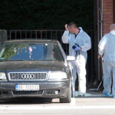 Ispod bele ponjave vire bose krvave noge: Leš ubijene žene u Rakovici još leži na parkingu