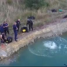 JEZIVO OTKRIĆE NA DNU JEZERA: Policija izvukla kofere iz vode, u jednom pronašli komad betona i OSTATKE ŽENE... (VIDEO)