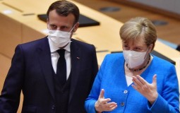 
					Makron i Merkel napuštali samit EU, ali se sad oprezno nadaju nagodbi za fond oporavka 
					
									