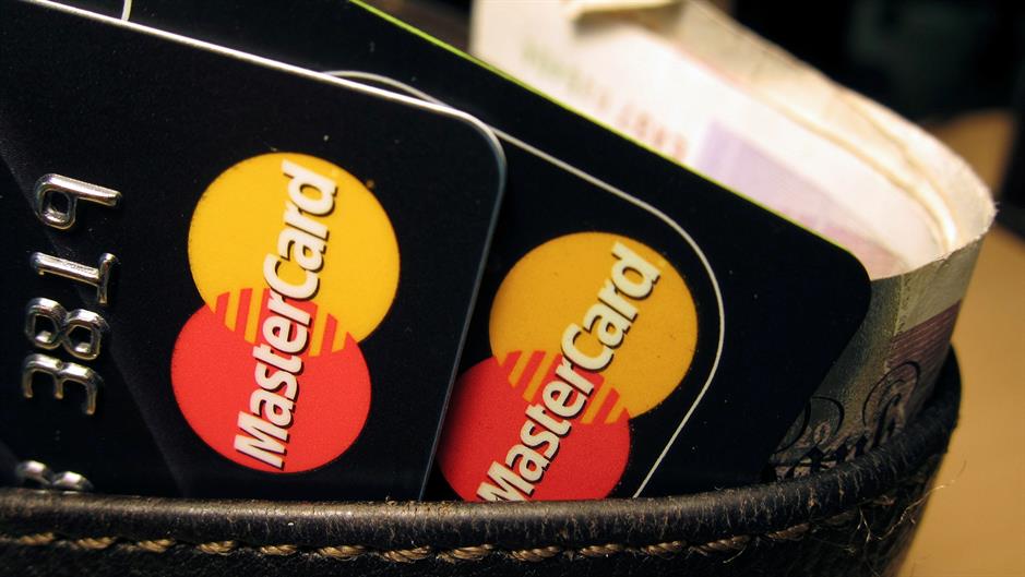 MasterCard denies excessive fees claim