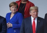 Merkel: Dolazak Zarifa paralelni događaj, nije deo samita
