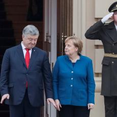 Merkelova u Kijevu: Rusiji produženje sankcija zbog situacije na severu Ukrajine