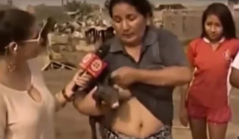 Mnogo bizarno: Žena zadigla majicu i podojila prase pred kamerama (VIDEO)