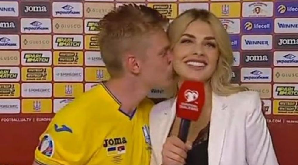 NE KRIJE EMOCIJE: Posle pobede nad Srbijom fudbaler Ukrajine poljubio seksi novinarku, a posle Portugala želeo da je odvede u krevet! (VIDEO)