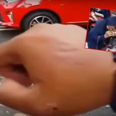 NEVEROVATNO: Žena ujela saobraćajca jer je hteo da joj napiše kaznu! (VIDEO)