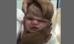 OKRUTNA ZABAVA: Medicinske sestre stiskale bebi glavu i smejale se (VIDEO)