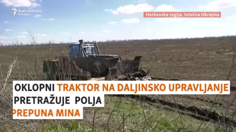 Oklopni traktor na daljinski u minskim poljima Ukrajine