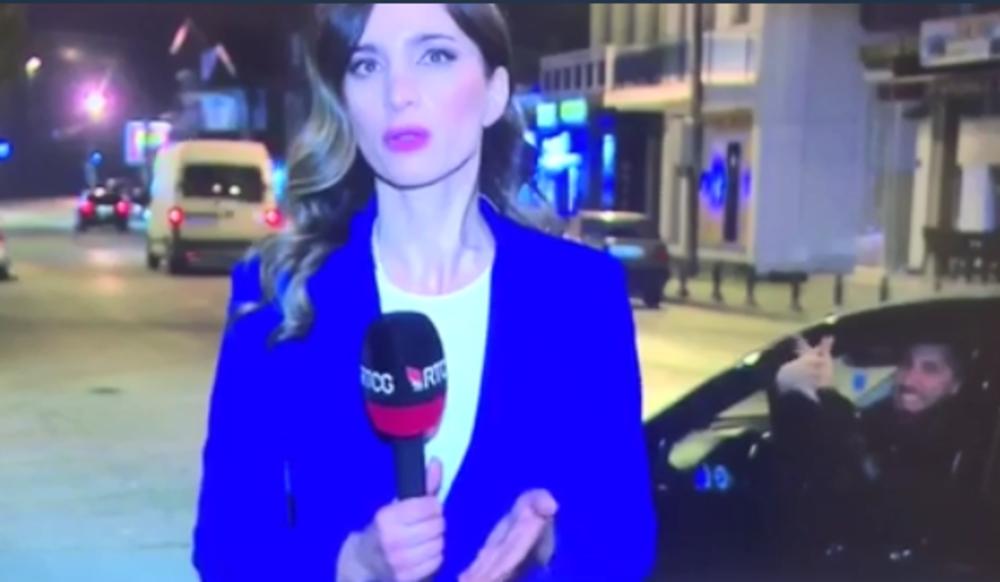 PROVOKACIJA USRED DNEVNIKA RTCG: Dok je novinarka izveštavala, mladić pokazao albanskog orla (VIDEO)