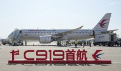 Prvi putnički avion domaće proizvodnje u Kini na prvom komercionalnom letu