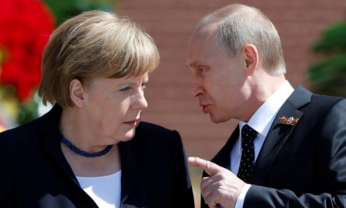 Putin sa Merkelovom o...