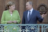 Putin sa svadbe pravo kod Merkel  o Ukrajini, Siriji...