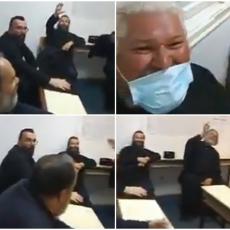SNIMAK UHAPŠENIH SVEŠTENIKA U POLICIJI: Uz osmeh i molitvu i pored brutalne torture Milove policije (VIDEO)