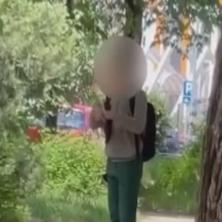 STRAVIČAN SNIMAK IZ NOVOG SADA: Momak repetira oružje u parku iza Muzičke škole (VIDEO) 