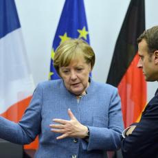 SUDAR TITANA! Merkelova poručuje: NE SLAŽEM SE SA MAKRONOM, to nije moj stav!