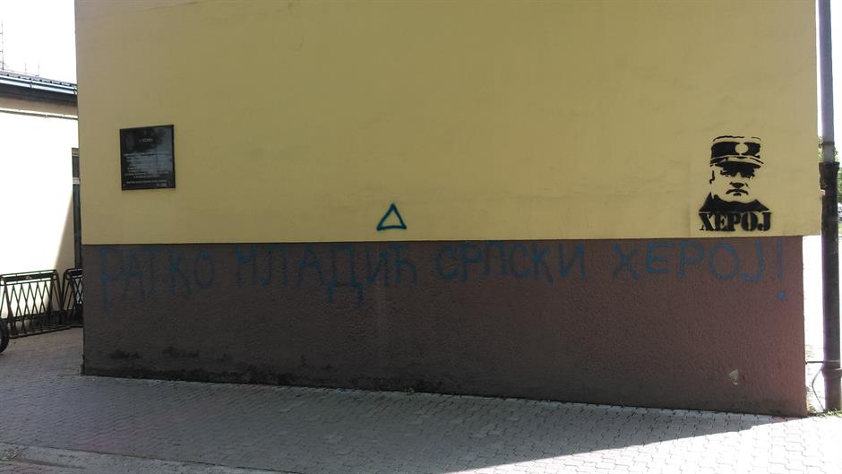 Serbia’s youth repaint graffiti celebrating Ratko Mladic