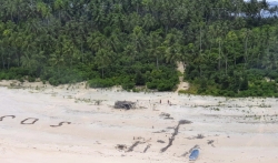 Trojica spasena s pacifičkog ostrva pomoću SOS poruke u pesku (VIDEO)