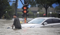 U poplavama u Kini od 20. jula stradalo 300 ljudi (VIDEO)
