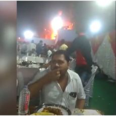 URNEBESNI SNIMAK KRUŽI MREŽAMA! Dok šator gori, gost na venčanju nastavlja da jede (VIDEO)