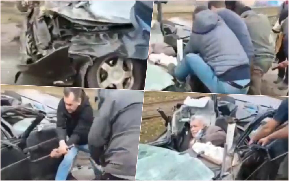UZNEMIRUJUĆ SNIMAK Rusko oklopno vozilo u Kijevu smrskalo automobil tokom vožnje. Građani pokušavaju da izvuku muškarca iz vozila