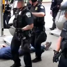 VIDEO KOJI JE ZGROZIO SVET: Ko je osoba koju je policija brutalno odgurnula i pustila da iskrvari (VIDEO)