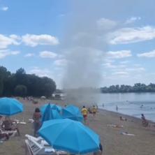 (VIDEO) Panika na plaži u Sremskoj Mitrovici: Nesvakidašnja pojava uznemirila kupače! Ljudi u neverici posmatrali, stvari letile unaokolo, spasioci reagovali